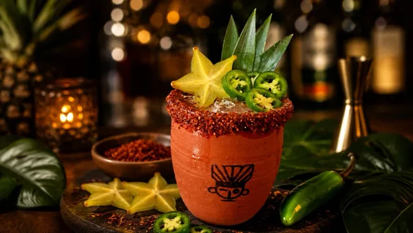 A tropical cocktail in a tiki cup