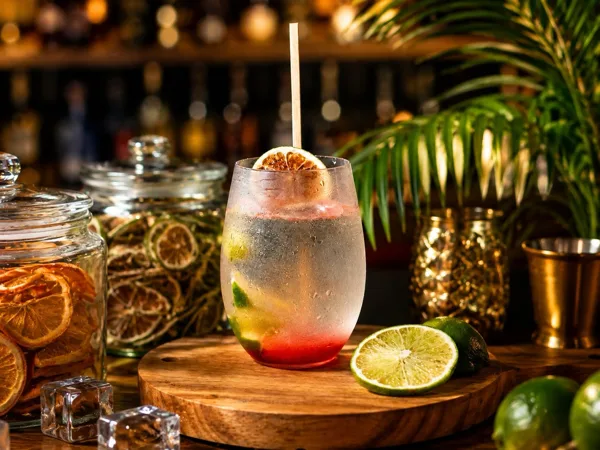 A colorful cocktail with citrus